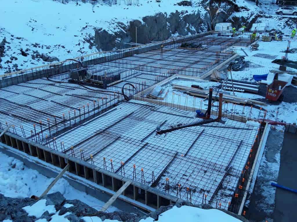 Reinforced concrete foundation construction at cold weather site | Trio Betong construction site.