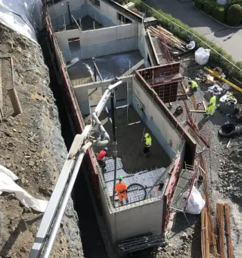 Concrete foundation pouring at Trio Betong construction site for building stability and durability.